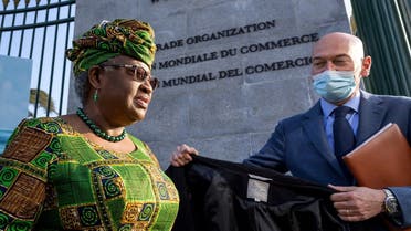 New Director-General of the World Trade Organisation Ngozi Okonjo-Iweala walks at the entrance of the WTO following a photo-op upon her arrival at the WTO headquarters to take an office in Geneva, Switzerland, on March 1, 2021. (Reuters)
