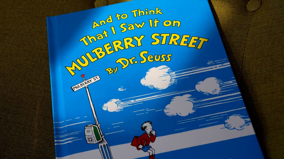 A copy of the book And to Think That I Saw It on Mulberry Street, by Dr. Seuss, rests in a chair, Monday, March 1, 2021, in Walpole, Massachussetts, US. (AP)
