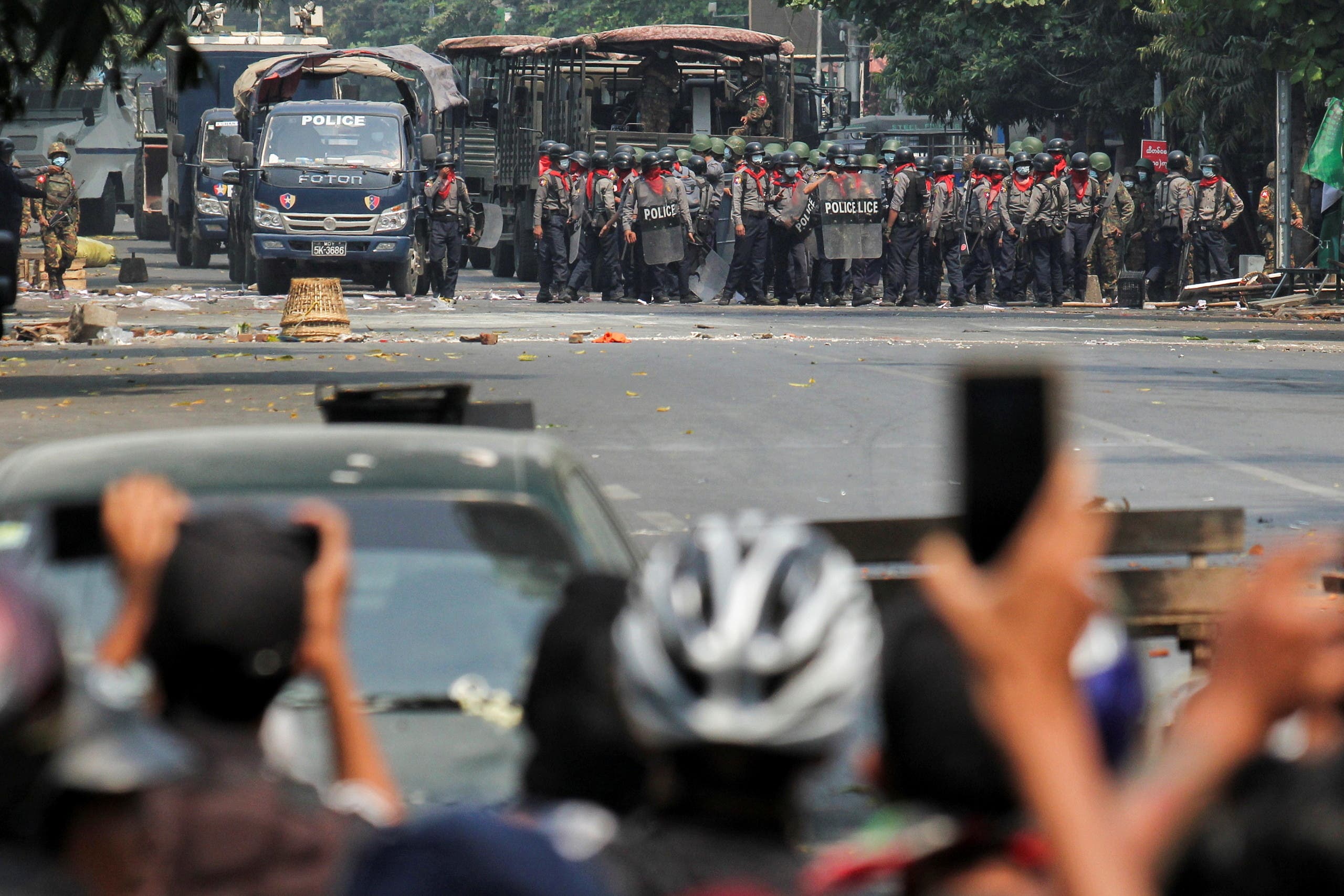Police stand on a road during an anti-coup protest in Mandalay, Myanmar, March 3, 2021. (Reuters)