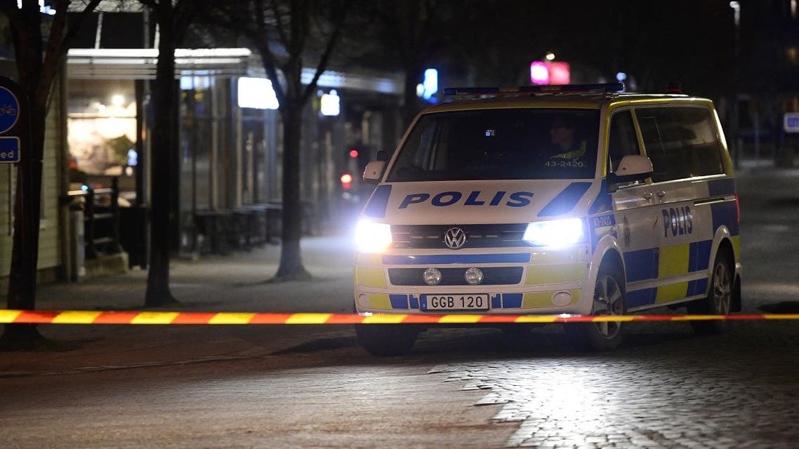 Police have cordoned off the scene where a man attacked eight people with a sharp weapon, seriously injuring two, in the Swedish city of Vetlanda on March 3, 2021. (AFP)