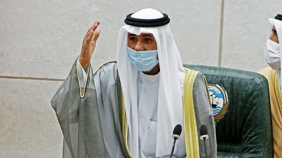 Emir of Kuwait Sheikh Nawaf al-Ahmad al-Jaber al-Sabah gestures during a parliament session