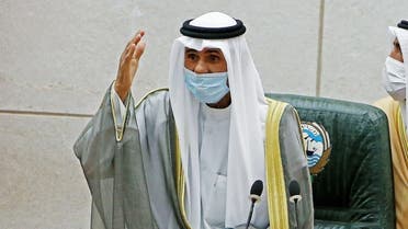 Emir of Kuwait Sheikh Nawaf al-Ahmad al-Jaber al-Sabah gestures during a parliament session