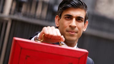 Britain’s Chancellor of the Exchequer Rishi Sunak holds the budget box outside Downing Street in London, Britain, on March 3, 2021. (Reuters)