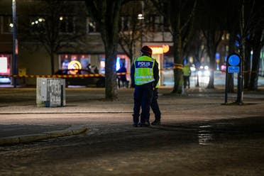 Police have cordoned off the scene where a man attacked eight people with a sharp weapon, seriously injuring two, in the Swedish city of Vetlanda on March 3, 2021. (AFP)
