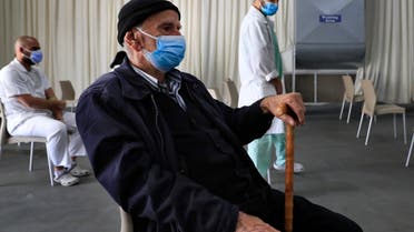 A man waits his turn to receive the Pfizer-BioNTech COVID-19 vaccine during a nationwide vaccination campaign, at the Saint George Hospital, in Beirut, Lebanon. (File photo: AP)