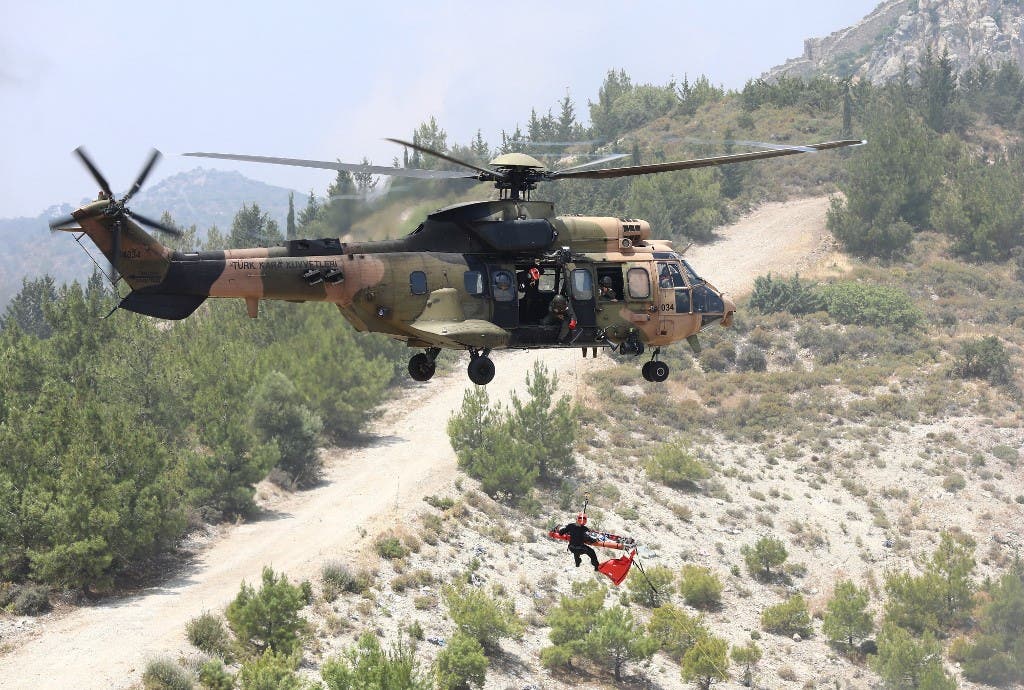A Turkish army's Eurocopter AS532 Cougar helicopter takes part in a military rescue mission exercise in the northern part of the Mediterranean island of Cyprus in the self-proclaimed Turkish Republic of Northern Cyprus, on June 11, 2019. (File photo: AFP)