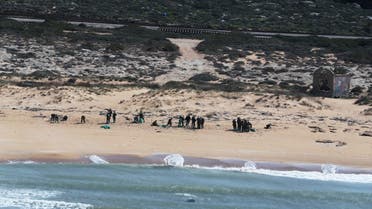 An aerial view shows Israeli soldiers cleaning tar from the sand after an offshore oil spill drenched much of Israel's Mediterranean shoreline, at a beach in Atlit, Israel. (Reuters)