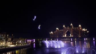 Watch: Paragliders defy gravity, fly around world's largest fountain in Dubai