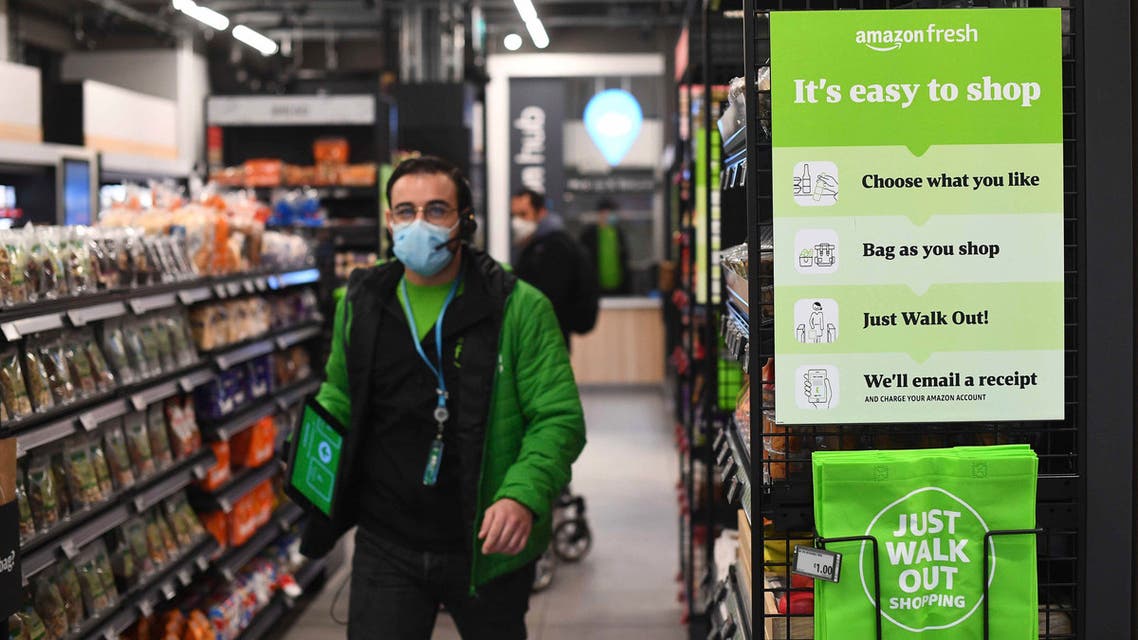 The Amazon Fresh grocery store opens in London, Thursday March 4, 2021, where a sign explains for shoppers to pick up items and walk out of the store, contactless, without the need for a till. (AP)