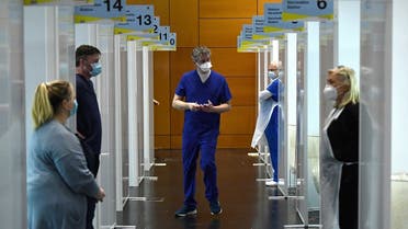Doctors wait at their vaccination booths, amid the outbreak of the coronavirus in Dublin, Ireland Feb. 20, 2021. (Reuters)
