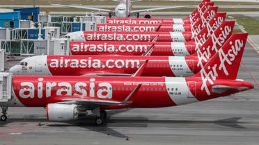 AirAsia planes are seen parked at Kuala Lumpur International Airport 2, during the movement control order due to the outbreak of the coronavirus, in Sepang, Malaysia April 14, 2020. (Reuters/Lim Huey Teng)