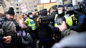 Hundreds protest COVID-19 restrictions in Stockholm