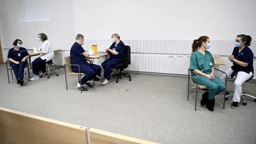 Medics receive the Pfizer-BioNTech coronavirus vaccines at the Helsinki University Hospital in Helsinki, Finland December 27, 2020. (Reuters)