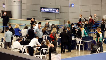 Israelis undergo Covid-19 tests at Ben-Gurion Airport near Tel Aviv on March 1, 2021. (AFP)