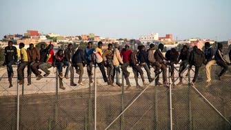 Dozens of migrants cross border from Morocco into Spain’s Melilla enclave