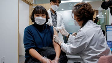 FILE PHOTO: A nursing home worker receives the AstraZeneca COVID-19 vaccine at a health care centre as South Korea starts a vaccination campaign against the coronavirus disease (COVID-19), in Seoul, South Korea February 26, 2021. REUTERS/Heo Ran/File Photo
