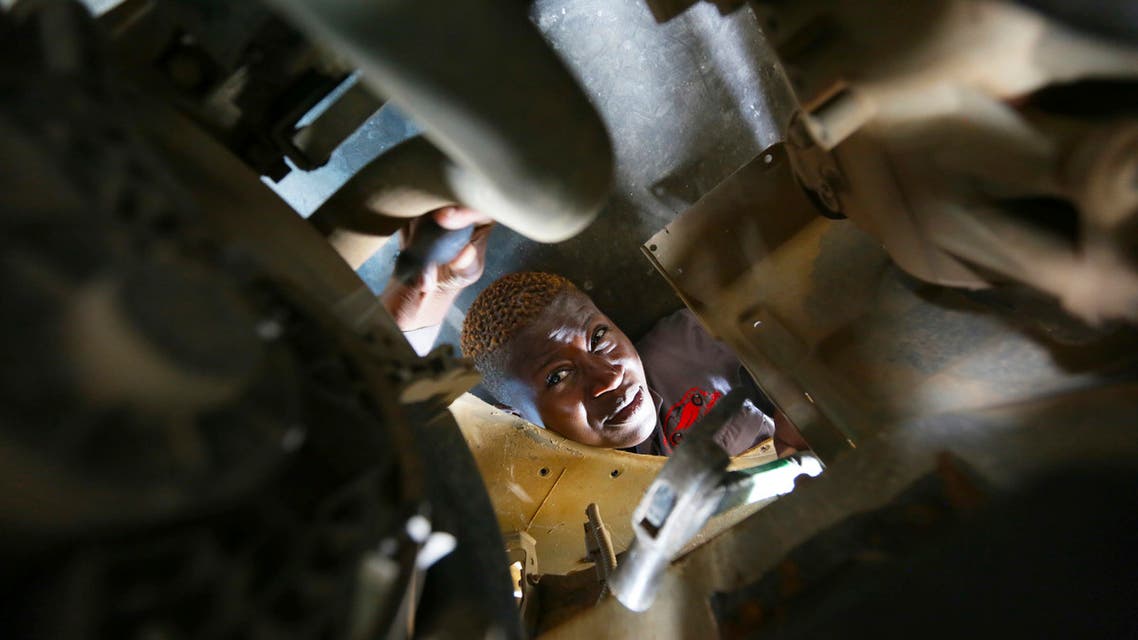 Memory Mukabeta repairs a car at her workshop in Harare, in this Friday, March,5, 2021 photo. (AP)