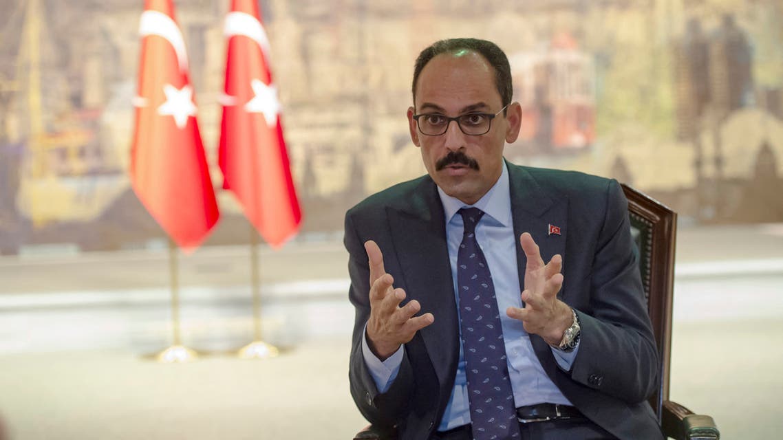 Turkey's Presidential Spokesperson İbrahim Kalın gestures as he speaks during an interview with AFP on October 19, 2019 in Istanbul. Turkey on Saturday urged the United States to use its leverage over Syrian Kurdish forces to ensure an orderly pullout under an agreement reached with Washington, the presidency spokesman said.
