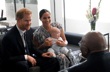 Britain's Prince Harry and his wife Meghan, Duchess of Sussex, holding their son Archie, meet Archbishop Desmond Tutu at the Desmond & Leah Tutu Legacy Foundation in Cape Town, South Africa, September 25, 2019. (Reuters)