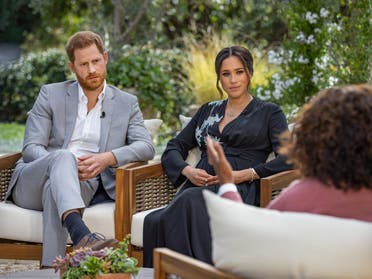  Britain's Prince Harry (L) and his wife Meghan (C), Duchess of Sussex, in a conversation with US television host Oprah Winfrey. (Harpo Productions via AFP)