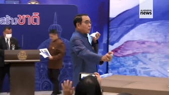 Thai Prime Minister sprays alcohol on reporters to escape questions