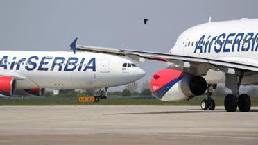 Air Serbia planes that are set to take medical supplies from the Nikola Tesla Airport to Italy to help the fight against the coronavirus disease (COVID-19), Belgrade, Serbia, April 25, 2020. (Reuters/Marko Djurica)
