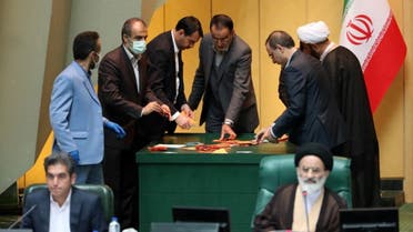 Iranian lawmakers count ballots after a vote for the new parliament speaker at the Iranian parliament in Tehran on May 28, 2020. (AFP)
