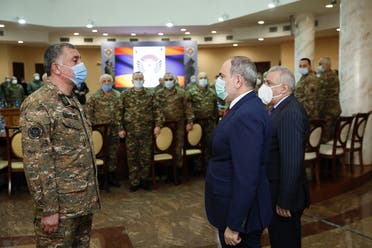 Armenian Prime Minister Nikol Pashinyan meets with top military officers in Yerevan on March 10, 2021. (AFP)