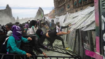 Women’s Day clashes in Mexico leave over 80 police, protesters injured