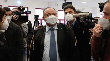 Italian anti-mafia prosecutor Nicola Gratteri (C) arrives in a special courtroom on January 13, 2021 for the opening of the 'Rinascita-Scott' maxi-trial in which more than 350 alleged members of Calabria's 'Ndrangheta mafia group and their associates go on trial in Lamezia Terme, Calabria. (Gianluca Chininea/AFP)