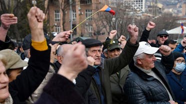 Armenian opposition supporters rally to demand the resignation of the prime minister over his handling of last year's war with Azerbaijan, in Yerevan on March 10, 2021. (AFP)