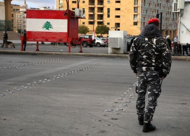 A Lebanese police walks in Beirut, Lebanon March 4, 2021. Picture taken March 4, 2021. (Reuters)