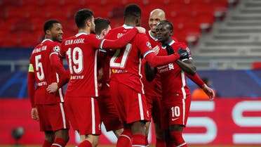  Liverpool's Sadio Mane celebrates scoring their second goal with teammates. (Reuters)