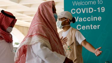 People take advantage of a new coronavirus vaccination center at the old Jeddah airport, Saudi Arabia. (AP)