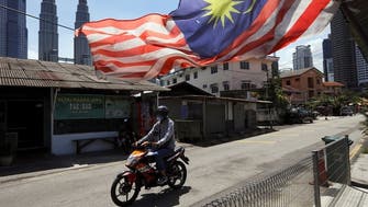 Malaysia to reopen borders from April with quarantine waiver