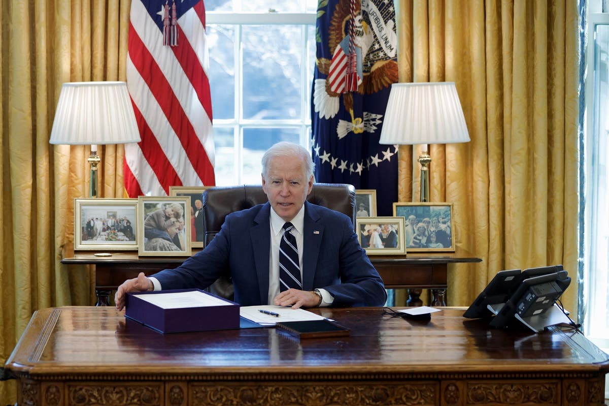 President Joe Biden looks on after signing the American Rescue Plan at the White House, March 11, 2021. (Reuters)