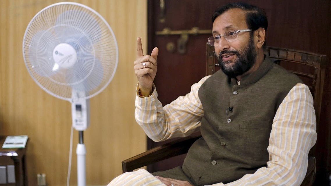 India's information and broadcasting minister Prakash Javadekar speaks on his phone before an interview with Reuters inside his office in New Delhi, India. (File photo: Reuters)