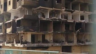 ظلت النيران مشتعلة بها 15 يوماً.. مصر تزيل بناية سكنية تفجيراً بالديناميت