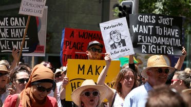People file through the streets with placards during the Women's March against the start of Donald Trump's presidency, in Sydney, Australia, Saturday, Jan. 21, 2017. (File photo: AP)