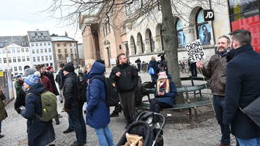 Protesters assemble next to the Copenhagen City Court building, after a thirty-year-old woman was sentenced to two years in prison for inciting violence during a speech at the beginning of an anti-lockdown protest on January 9, Copenhagen, Denmark. (Reuters)