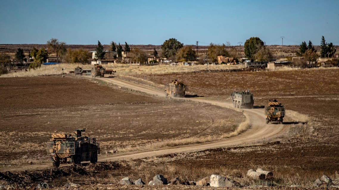A joint Russian-Turkish patrol advances in the countryside of the Syrian town of al-Jawadiyah, in the northeastern Hasakeh province, near the border with Turkey, on December 24, 2020. (File photo: AFP)