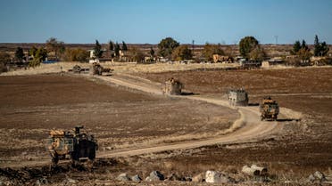 A joint Russian-Turkish patrol advances in the countryside of the Syrian town of al-Jawadiyah, in the northeastern Hasakeh province, near the border with Turkey, on December 24, 2020. (File photo: AFP)