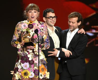 Taylor Swift, Jack Antonoff, and Aaron Dessner accept the Album of the Year award for ‘Folklore’ onstage during the 63rd Annual GRAMMY Awards at Los Angeles Convention Center on March 14, 2021. (File photo: AFP)