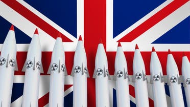 Nuclear missiles in a row and flag of United Kingdom stock photo