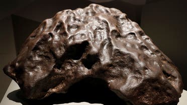 Tamentit, a chondrite that fell in Algeria in 1864 is displayed as part of the exhibition Meteorites, between sky and earth, on October 17, 2017 at the Museum d'histoire naturelle in Paris.