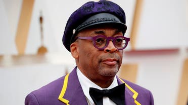 Director Spike Lee, wearing a coat with the number 24 in memory of NBA player Kobe Bryant, poses on the red carpet during the Oscars arrivals at the 92nd Academy Awards in Hollywood, Los Angeles, California, US, on February 9, 2020. (Reuters)
