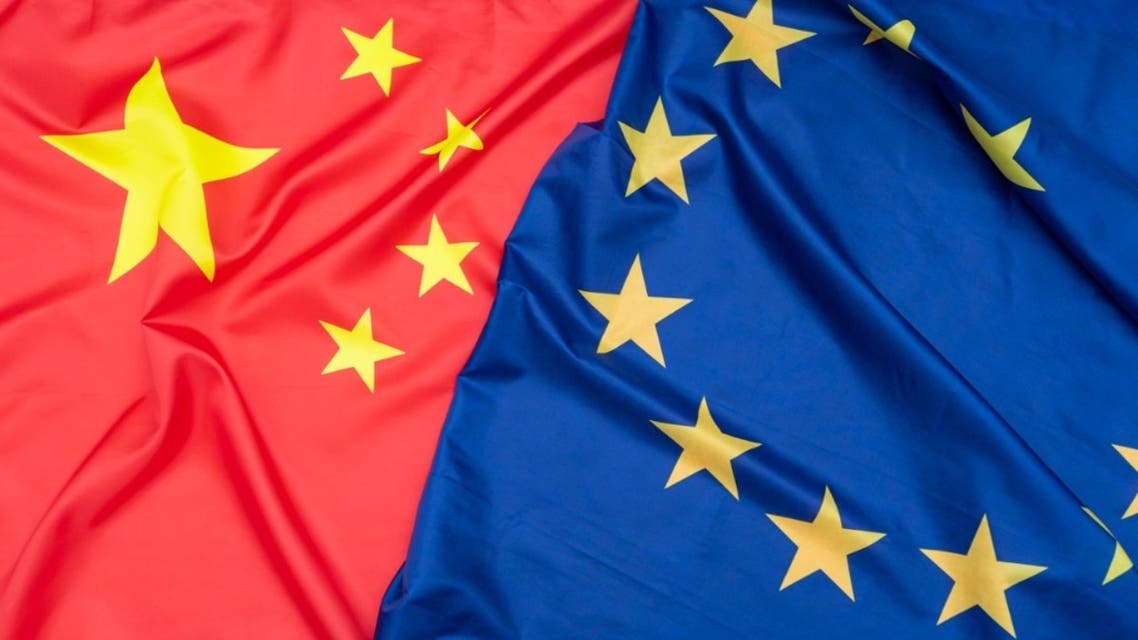 Real natural fabric flag of China or National Flag of the People's Republic of China and EU European Union flag as texture or background stock photo