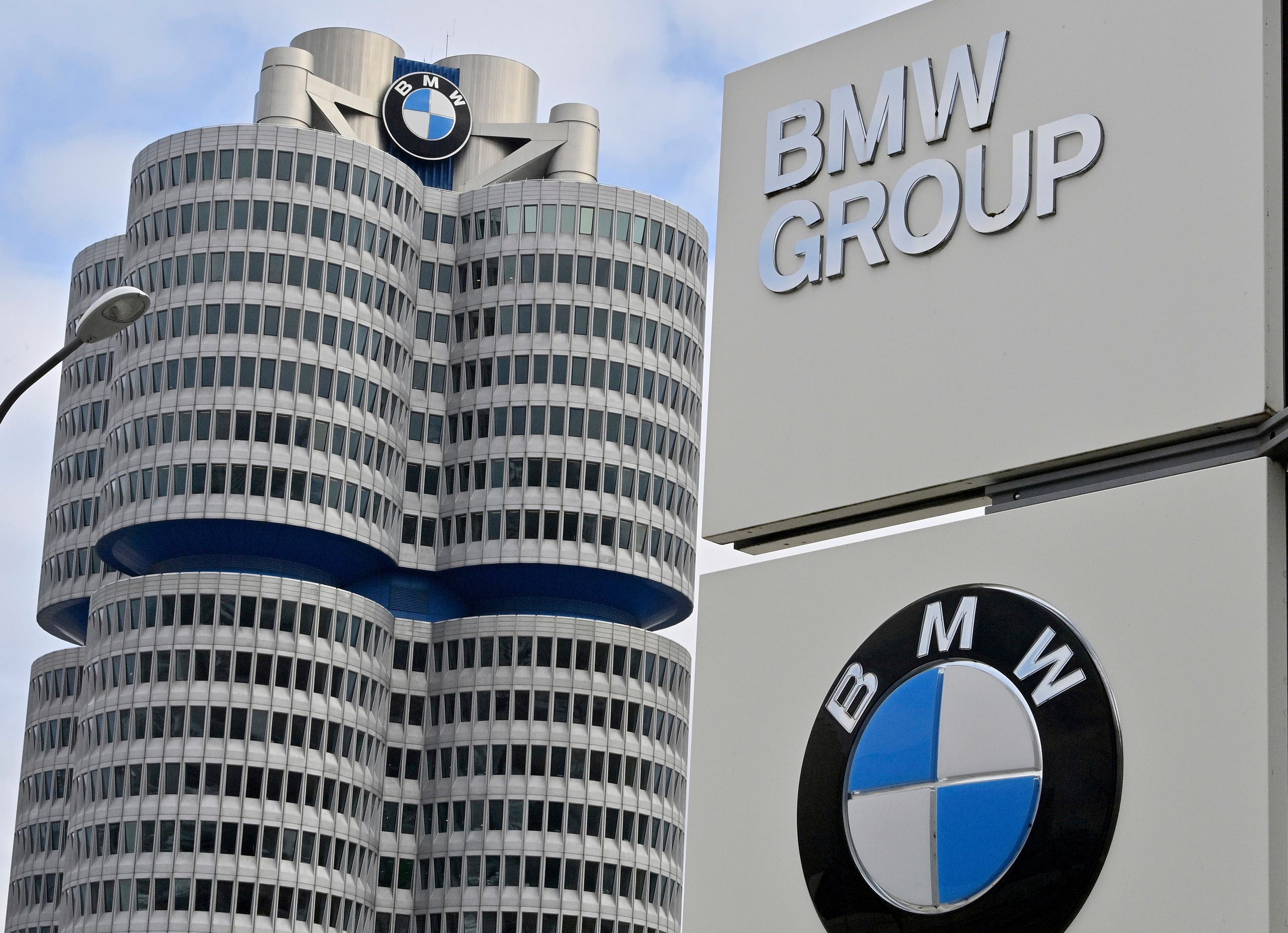 The BMW Group headquarters are pictured in Munich, Germany, Wednesday, March 16, 2021. German automaker BMW said Wednesday it intends to speed up the rollout of new electric cars, vowing to bring battery powered models to 50% of global sales by 2030. (Peter Kneffel/dpa via AP)