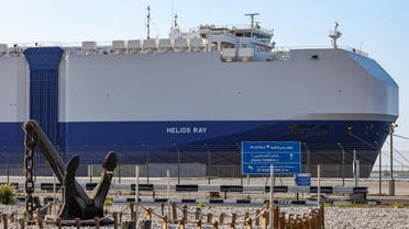 This picture taken on February 28, 2021 shows a view of the Israeli-owned Bahamian-flagged MV Helios Ray cargo ship docked in Dubai's Mina Rashid (Port Rashid) cruise terminal. (Reuters)