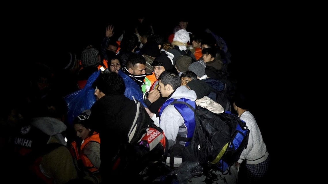 Refugees aboard a dinghy sail for the Greek island of Chios as they try to travel from the western Turkish coastal town of Cesme, in Izmir province, Turkey. (Reuters)
